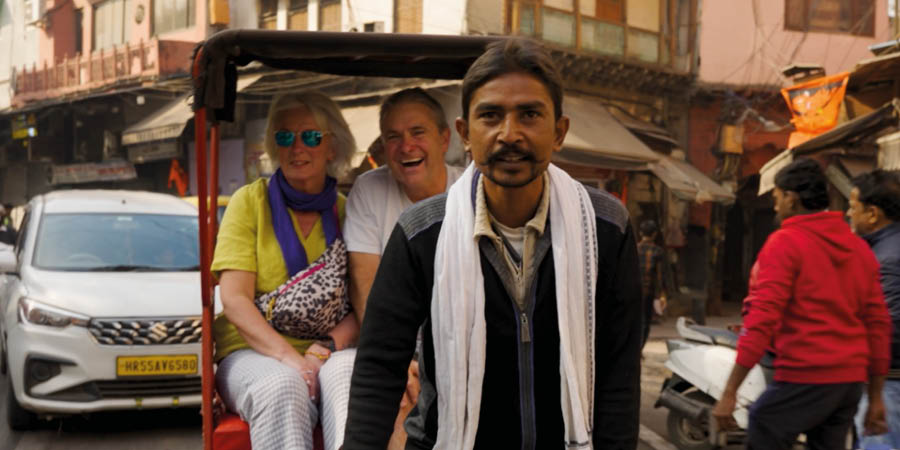 Embarking on a rickshaw ride through the bazaars of Delhi